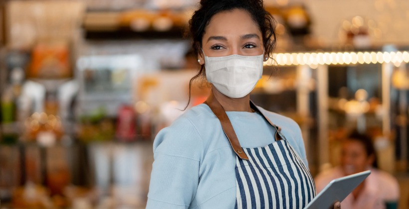 https://www.playerlync.com/wp-content/uploads/2021/03/beautiful-waitress-working-at-a-restaurant-wearing-a-facemask-picture-id1225861935.jpg
